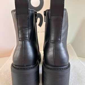 Elegant Black Leather Heeled Boots
